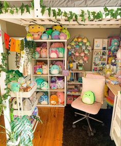 a room filled with lots of stuffed animals on shelves next to a desk and chair