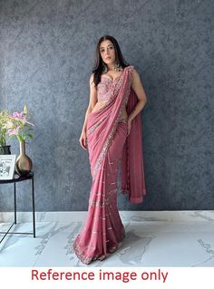 Georgette saree with blouse, Pink saree for women, wedding saree for function, sequence saree for evening wear, designer saree for function Saree Details:  Saree Color: Pink  Saree Fabric:  Faux Georgette Saree Work: Fancy  Thread Work  With  Sequence Work Saree Length:5.5 Meter Blouse Details : (UN-Stitched) Blouse Color: Matching. Blouse Length: 0.8meter Blouse Fabric:  Heavy Mono banglory Blouse Work:All Over Thread With  Sequence Work Blouse wear by model is just for modeling purpose only, a Diwali Party Wear Georgette Pre-draped Saree, Evening Anarkali Style Pre-draped Saree, Party Wear Pre-draped Saree With Zari Work For Diwali, Pre-draped Saree For Reception And Diwali, Party Wear Pre-draped Saree With Unstitched Blouse, Wedding Saree With Semi-stitched Blouse, Pre-draped Saree With Unstitched Blouse For Diwali Reception, Sheer Dupatta Saree For Reception, Evening Traditional Drape Pre-draped Saree In Dola Silk