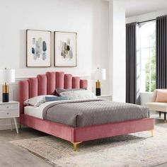 a bedroom with a pink bed and white walls