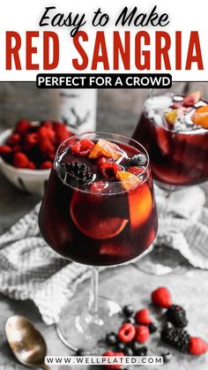 red sangria in a glass with berries and ice on the side, text overlay reads easy to make red sangria perfect for a crowd