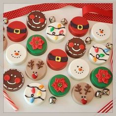 decorated cupcakes are arranged in the shape of santa's hats and snowmen