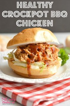 healthy crockpot bbq chicken sandwich on a plate