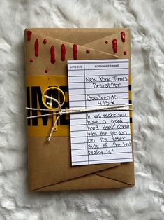 a brown envelope with a note attached to it