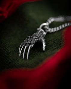 The Tools of Horror collection brings us the sweetest dreams. And a nightmare of a glove. .925 Sterling Silver Measurements: 38mm x 22mm x 13mm Handmade in USA Horror Collection, Sweetest Dreams, Wallet Chains, Baby Pop, King Baby, Best Wallet, A Nightmare, Stone Collection, Ring Pendant Necklace