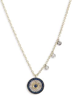 An evil-eye pendant comprised of sparkling diamonds and blue sapphires wards off bad vibes on a 14-karat-gold necklace detailed with a trio of round shakers. Total diamond weight: 0.12ct. Color: G–H Clarity: SI1–I1 14k gold/diamond/blue sapphire Imported >Diamond Guide Diamond Evil Eye Pendant Necklace, 14k Yellow Gold Evil Eye Charm Necklace, Luxury Evil Eye Round Pendant Necklace, Spiritual Yellow Gold Evil Eye Necklace, Yellow Gold Evil Eye Round Pendant Jewelry, Boho Beautiful, Diamond Evil Eye, Diamond Guide, Evil Eye Pendant