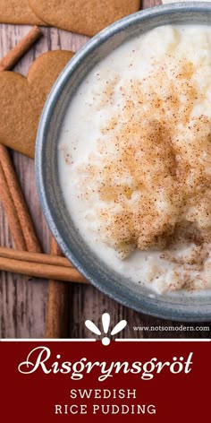 a bowl of rice pudding with cinnamon sprinkles and ginger on the side