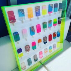 an ice cream display with pops and sprinkles