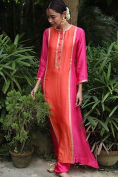 Featuring a vibrant pink kurta in modal silk base with gota hand embroidery. It is paired with matching pants.   Fit: Fitted at bust and waist. COMPOSITION: Modal silk. CARE: Dry clean only. Satin Kurti Designs, Orange And Pink Outfit, Satin Kurta, Gota Embroidery, Luxury Pret, Craft Techniques, Pink City