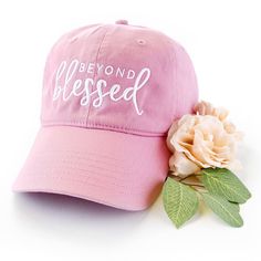 Pink dad hat with beyond blessed embroidered on the front Blessed Design, Pink Baseball Hat, Bridesmaid Groomsmen Gifts, Beyond Blessed, Christian Hats, Faith Clothing, Cap White, Hat Ideas, Christian Jewelry