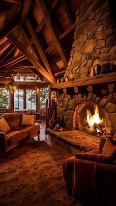 a living room filled with furniture and a fire place in the middle of it's walls