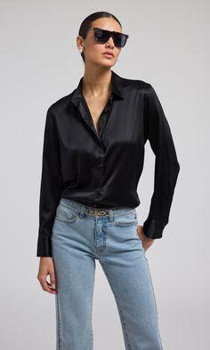 95% Silk/5% Elastane Unlined Professional Dry Clean Relaxed Fit Length: 28" Iridescent Buttons Style: W01124003 Model Size & FitModel wears a size XSModel's height: 5'10”/177cm Silk Shirt Leather Pants, Silk Blouse Outfit, French Cuff, Denim Trends, Blouse Outfit, Dress Pant, New Tops, Jacket Sale, Black Silk