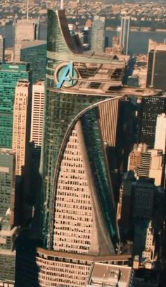 an aerial view of a city with tall buildings and skyscrapers in the foreground