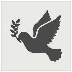 the dove with an olive branch in its beak is shown on a gray square background