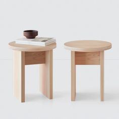 two small wooden tables sitting next to each other