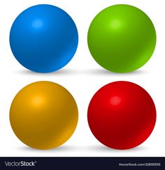 three different colored balls on a white background