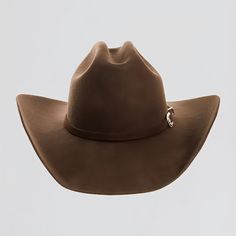 Introducing the Cattleman - Brown Felt Cowboy Hat! This shows off a handsome cowboy brown band that is perfect for those seeking a rustic look. The brim measures 3 3/4", while the crown comes in at 4 1/2". The hatband is sewn in and the hat is made of wool felt. Felt Cowboy Hat, Handsome Cowboys, Felt Cowboy Hats, Blowout Sale, Cowgirl Hats, Hat Band, Cowboy Hat, Equatorial Guinea, Pitcairn Islands