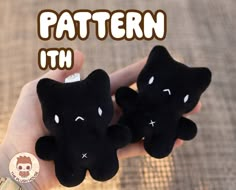 two black stuffed animals are held in the palm of someone's hand with text that reads pattern ith