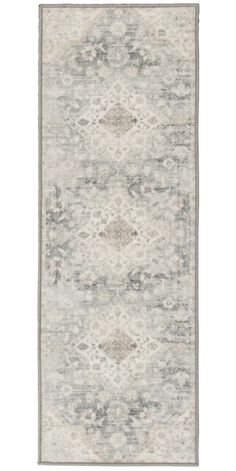 an area rug with grey and white colors on the bottom, in front of a white background