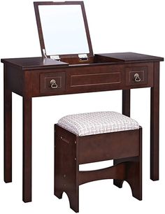 a wooden desk with a mirror and stool