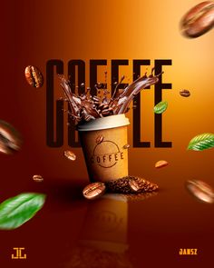 a coffee cup with chocolate splashing out of it and leaves flying around in the air