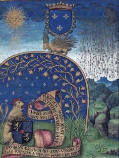 an illuminated manuscript with animals and symbols on it