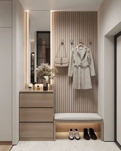 a closet with shoes, coat and purse on it