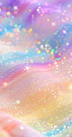 an abstract background with stars and blurry lights in pink, blue, yellow and white