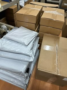 several boxes are stacked on top of each other in the warehouse, with one being unwrapped