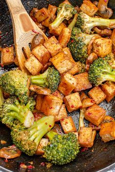 tofu and broccoli stir fry in a skillet with an easy tasty sauce