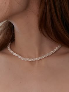 Editor's NotesOvla presents a necklace with pearl chains layered and twisted. This item is made of pearls of excellent quality. - Pearl chain - Metal logo linked to the clasp- Handmade- Sophisticated and elegant style Measurements(in.)One Size- Length: 15.35 in. ( + 2.36 in.)- Width: 0.28 in. Composition & Care- Material: Pearl- Avoid direct heat and moisture- Plated products may discolor over time due to their nature.- Please be careful that discoloration Twisted Pearl Necklace, Elegant Pearl Necklace, Pearl Beaded Necklace With Chain, Seed Pearl Necklace, Elegant Beaded Spiral Jewelry, Elegant Twisted Chain Necklace Gift, Elegant Twisted Chain Necklace For Gift, Elegant Beaded Necklace, Chains Layered