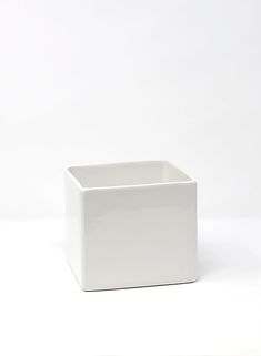 a white square container sitting on top of a table