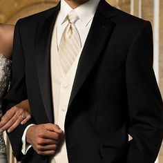 a man and woman dressed in formal wear