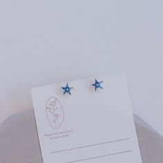 A beautiful blue crystal star earrings made with high quality solid 925 sterling silver. NOTE: You will only receive the blue star studs. The black and silver moon earrings are sold separately. See shop for more. PRODUCT DETAILS - Dimensions: 0.6 x 0.7 cm - Closure: Push back with butterfly backings - Main Material: 925 Sterling Silver - Stone: Cubic Zirconia  - Hypoallergenic - Nickel & Lead Free SHIPPING & PACKAGING Our jewelries are well packaged with care and will be shipped out within 1-3 business days via USPS.  Please don't hesitate to message us if you have any questions. We are fast to respond and would love to hear from you! Blue Star Charm Jewelry, Blue Star-shaped Celestial Jewelry, Celestial Blue Star-shaped Jewelry, Blue Star Charm Earrings As Gift, Blue Star Charm Earrings For Gift, Blue Star Earrings With Star Charm, Hypoallergenic Blue Star Earrings, Blue Star-shaped Celestial Earrings, Blue Star-shaped Sterling Silver Earrings