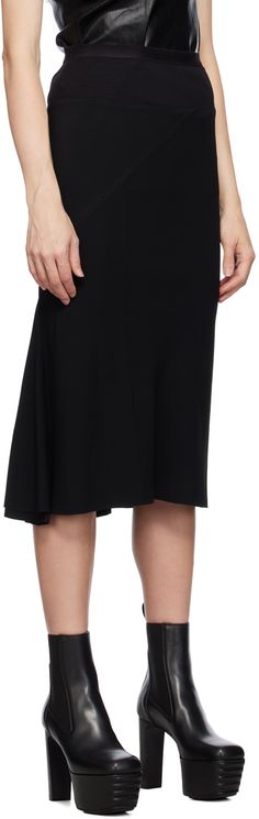 Lightweight FSC®-certified viscose-blend crepe skirt. · Paneled construction · Rib knit trim at elasticized waistband · Raw edge at hem Supplier color: Black Crepe Skirt, Crepe Skirts, Black Knees, Rick Owens, Raw Edge, Apparel Accessories, Rib Knit, Midi Skirt, Trim