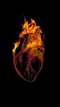 a fire heart in the dark with red and yellow flames