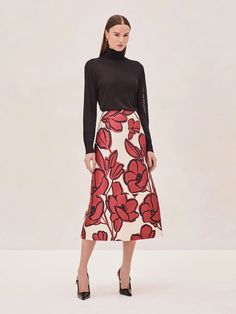 Introducing the Patel Skirt which features a bold floral print that stands out with its intricate detailing and contrast. Crafted in a sleek, flattering silhouette that falls gracefully to a midi length, the Patel Skirt offers a refined yet eye-catching look. Thoughtfully designed with hidden side pockets, it combines style and functionality. Red Floral Skirt, Perfect White Tee, Latest Skirts, Bold Floral Print, Knit Denim, Floral Midi Skirt, Girls Wardrobe, Fall Shopping, White Skirts