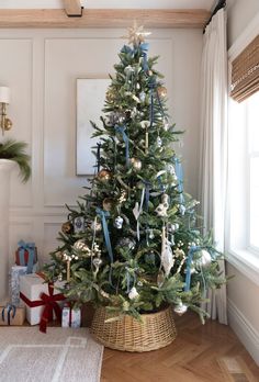 a decorated christmas tree in a living room