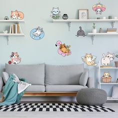 a living room filled with furniture and lots of wall stickers