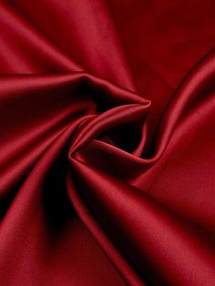 Indulge in the luxurious feel of this 58"/60" wide (147/152 cm) Silk Skin Duchess fabric, also known as Peau de Soie. Its dull satin finish and lightweight drape make it a perfect choice for creating elegant bridesmaid dresses, formal gowns, or any special occasion attire. With a subtle sheen and smooth texture, this high-quality silk fabric offers a sophisticated look and feel. Whether you're a professional dressmaker or an avid sewing enthusiast, this versatile material will elevate your projects with its timeless beauty and exceptional craftsmanship. Elevate your sewing experience and create stunning garments that will turn heads with this premium Silk Skin Duchess fabric. Luxurious Fabric: Crafted from exquisite peau de soie silk, this fabric offers a dull satin finish and a smooth, su Luxury Fabric Texture, Dark Red Clothes, Red Silk Background, Farewell Dress Ideas, Duchess Fabric, Red Silk Fabric, Farewell Dress, Red Satin Fabric, Satin Colors