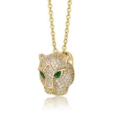 14k Yellow Gold Plated with Emerald & Cubic Zirconia 3D Panther Head Pendant Layering Necklace. Look super fierce with this brightly polished 14k yellow gold plated necklace featuring a 3D panther head pendant. Emeraldcubic zirconias (May Birthstone) nestle in the eyes, complemented by round brilliant cut cubic zirconias pave set on the face. A durable cable chain connected on each side of the head allows it to sit centered, finished with a secure lobster clasp in the back. Panther Head, Zodiac Pendant Necklace, Trending Necklaces, Forever Jewelry, Initial Pendant Necklace, May Birthstone, Layering Necklace, Evil Eye Jewelry, Mens Jewelry Bracelet