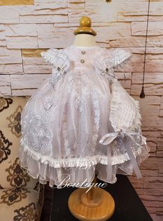 "★Our Lady of Guadalupe Baptism Dress★ ★Occasion: Baptism, Child Blessing or any Special Occasion ★Comes With: Dress  ★Measurements 9/12 months, (Long 21\") (Waist 20\") (Shoulder to Shoulder 8\") 12/18 months, (Long 23\") (Waist 20\") (Shoulder to Shoulder 8\") 2 years, (Long 25\") (Waist 21\") (Shoulder to Shoulder 8\") 3 years, (Long 27\") (Waist 22\") (Shoulder to Shoulder 8\") 4 years, (Long 31\") (Waist 23\") (Shoulder to Shoulder 9\") 6 years, (Long 33\") (Waist 26\") (Shoulder to Shoulder 9.5\") -Waist measurement is around ★Features: The back is open, for comfort when you load the baby (The waist is adjustable, has two ribbons to make a bow, as in the photo) Please check the measurements, and any questions send me a message,  your satisfaction is very important for me Comes with a Cream Baptism Dress With Ruffles For Pageant, Pageant Baptism Dress In Cream With Ruffles, Girl White Dress, Girls White Dress, Christening Gown, Baptism Dress, Our Lady Of Guadalupe, Dress Occasion