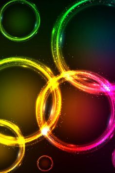 an abstract background with circles and bubbles in bright colors on a black background, suitable to use as a backdrop or wallpaper