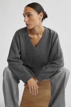 Our take on the classic and timeless V Neck Sweater. This slouchy oversized drop-sleeve V-neck is destined for everything to chic cozy mornings and afternoons. In 100% merino wool its an essential piece for the colder months ahead. Wool Cashmere Sweater, Luxury Crew Neck Sweatshirt For Layering, Luxury V-neck Sweater For Winter Workwear, White Button Down Peaking Out Under V Neck Oversized Sweater, Grey V Sweater, Drop Back Sweaters, Luxury V-neck Sweater For Everyday, Luxury V-neck Sweater For Winter, Oversized V-neck Sweater For Winter