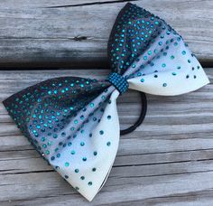 "Our bows are very durable and are made from quality products. Cheer bows are made with grosgrain ribbon and specialty fabrics. We also offer vinyl, glitter, rhinestones, sublimation, and sequins all in a variety of colors to customize your individual bow or team bow. Note: Actual fabric colors may vary from the screens of electronic devices. Bow sizes for standard cheer bows are approximately 7\"x8\" and for tailless bows 4\"x6\", unless otherwise specified. Custom sizing is available. Contact Cheerleading Bow, Cheer Life, Ombre Top, Best Bow, Glitter Ombre, Aesthetic Phone Case, Spirit Wear, Glitter Bow