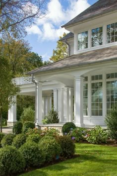 a large white house with columns and windows