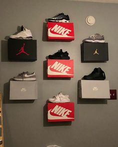 the wall is filled with nike shoes and other items