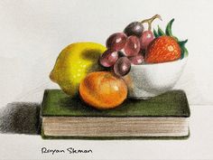 a drawing of fruit on top of a book