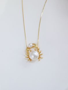 Introducing our handmade crab pearl pendant charm! Comes with the S925 Sterling Silver necklace chain, this piece makes a thoughtful and imaginative gift for anyone who loves the sea, nature, or unique jewelry pieces. Pearl: AAA Natural White/Pink with iridescent luster Necklace: 40cm+5cm (15.7''+2'') extension chain Necklace material: S925 Sterling Silver Accessories material: 14K Gold Plating, Luxurious gold layer over sterling silver for added elegance and durability. At WilakoraPearl our pri Gift Pearl White Necklace, Silver Pearl Necklace With Charms As A Gift, Silver Pearl Necklace With Charms For Gift, Pearl Jewelry With Lobster Clasp For Gift, Pearl White Jewelry With Lobster Clasp For Gift, White Pearl Necklace With Charms As Gift, Charm Pendant Pearl Necklace For Gift, Gift Pearl Pendant Necklace With Lobster Clasp, Gift Pendant Pearl Necklace With Lobster Clasp