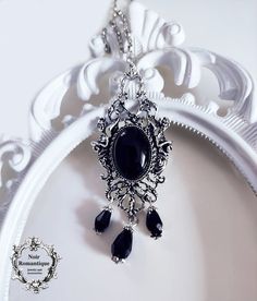 A beautiful ornate centerpiece holding a black onyx gem and hanging teardrop beads Gothic Pendant, Dark Jewelry, Gothic Earrings, Goth Jewelry, Gothic Necklace, Gothic Rings, Gem Necklace, Teardrop Beads, Wing Earrings