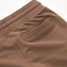 A comfy basic they’ll never want to take off! These Vintage Brown Cargo Shorts are made with super soft Soluxe® Bamboo. With a relaxed fit, longer length and front pockets for keeping treasures, they’re as practical as they are cute. The best feature? They go with everything! Crafted in our super-soft & durable Soluxe® Bamboo blend Flat sewn-in label that's sensory friendly and gentle on eczema-prone skin French terry interior fabrication for cozy comfort Relaxed fit, perfect for playtime Length Brown Summer Cargo Shorts With Side Pockets, Brown Streetwear Shorts With Pockets, Brown Cotton Cargo Shorts With Side Pockets, Brown Cargo Shorts, Beige Cotton Cargo Shorts, Military Style Cotton Cargo Shorts, Grey Denim Jacket, Camo Tee, Sensory Friendly